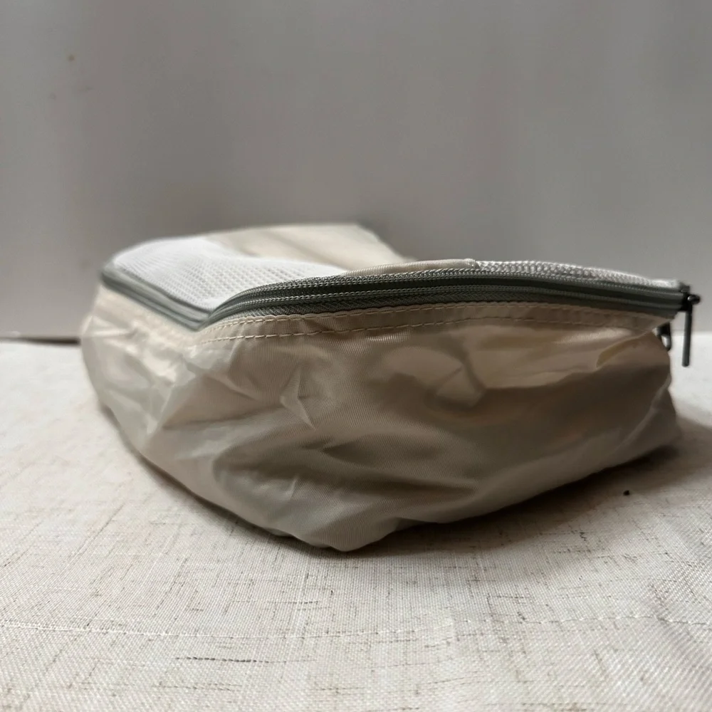 5️⃣Cream Garment Bag for Travel and Home